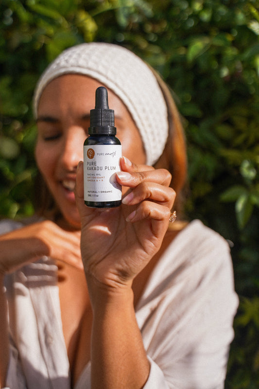 Lady holding Pure Kakadu Plum Facial Oil