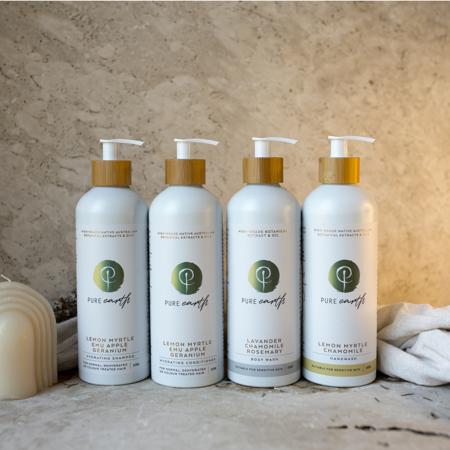 Pure Earth eco bundle with four products on a textured surface with a neutral background