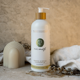 A pump bottle of natural hand wash with &