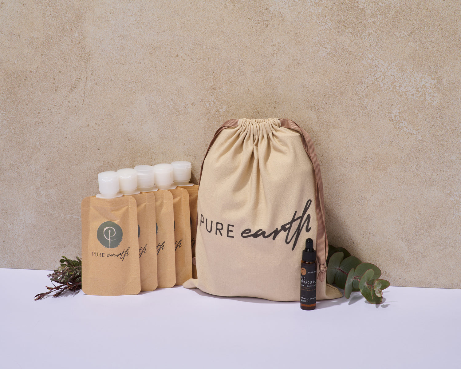 Pure Earth sample bag natural skincare and haircare set Australia linen bag with shampoo conditioner body wash body lotion hair treatment and vitamin C serum