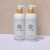 Two bottles of Pure Earth natural lavender chamomile rosemary body wash on a beige background